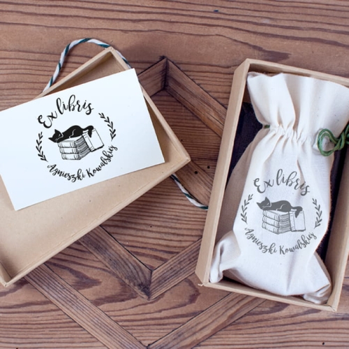 ex libris kot na książkach