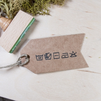 Stempel z oznaczeniami prania i prasowania